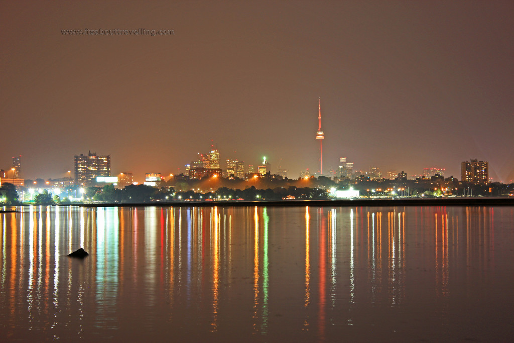 toronto skyline night lake ontario